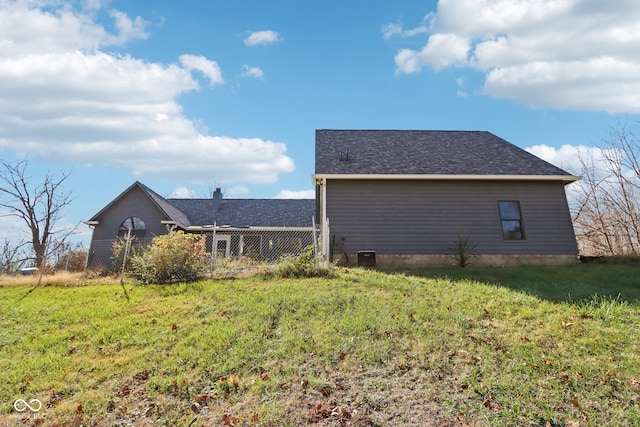 view of home's exterior featuring a lawn