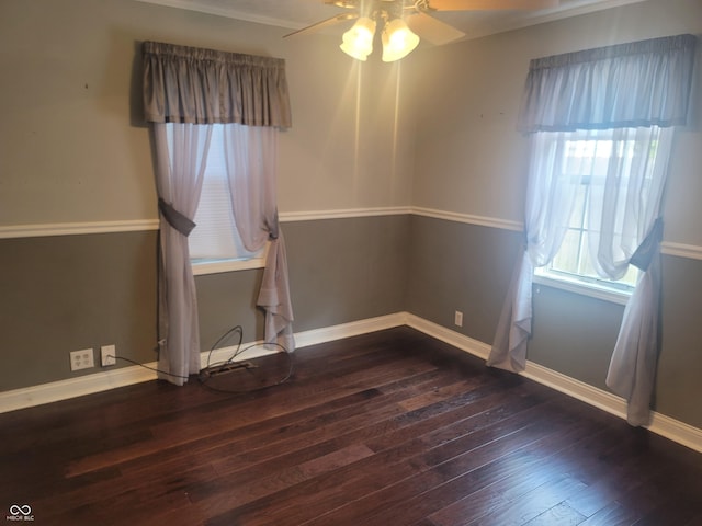 spare room featuring ceiling fan and wood-type flooring