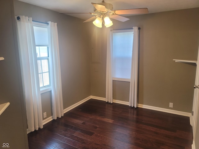 empty room featuring hardwood / wood-style flooring and ceiling fan