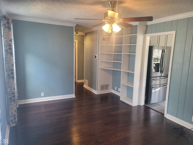 unfurnished room featuring ceiling fan, wood-type flooring, crown molding, and a textured ceiling