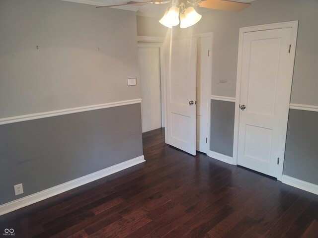 spare room with ceiling fan and hardwood / wood-style floors