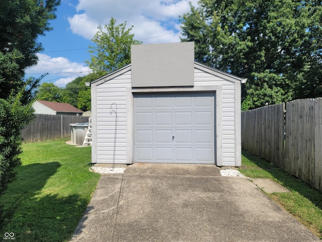 garage with a yard