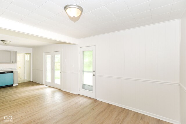 unfurnished living room with light hardwood / wood-style floors