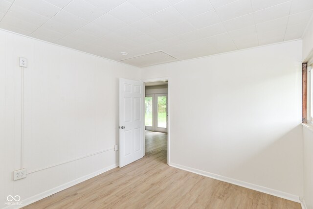 spare room featuring light hardwood / wood-style flooring