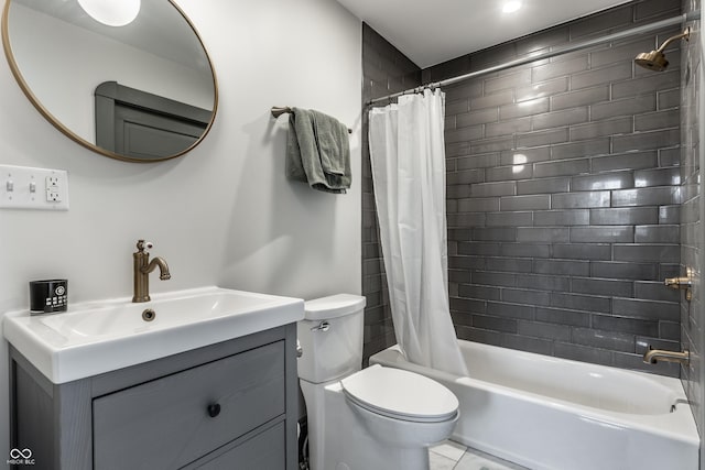 full bathroom with shower / tub combo with curtain, vanity, and toilet