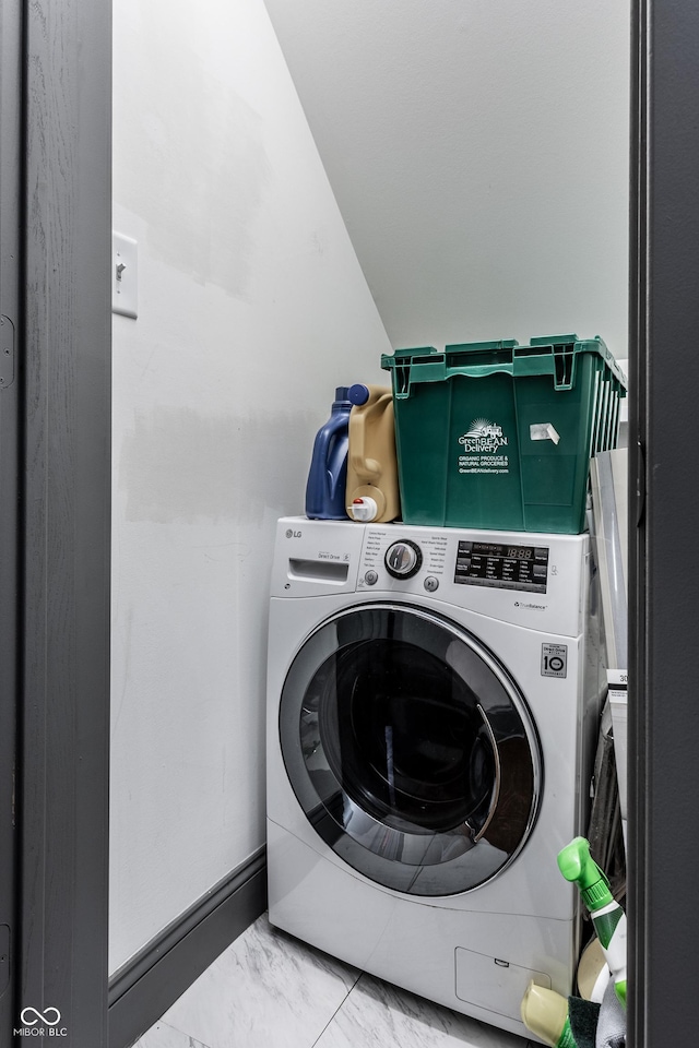 laundry area with washer / dryer