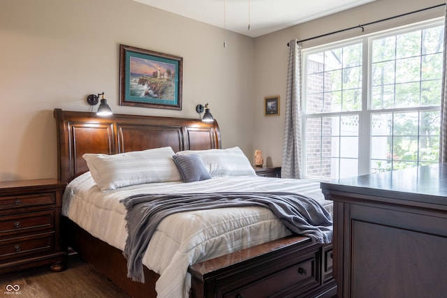 bedroom featuring dark wood-type flooring