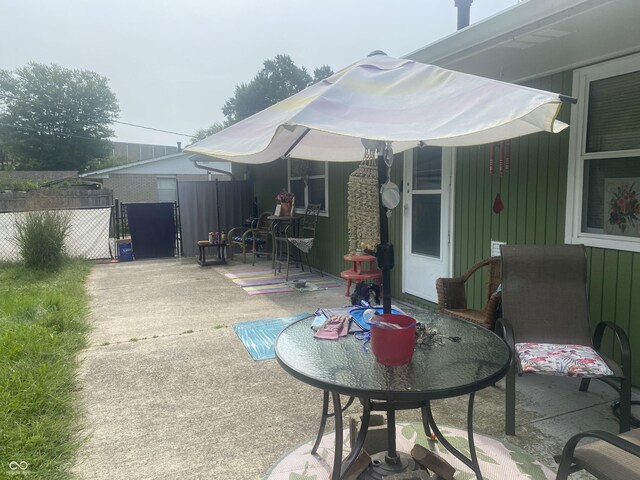 view of patio with fence