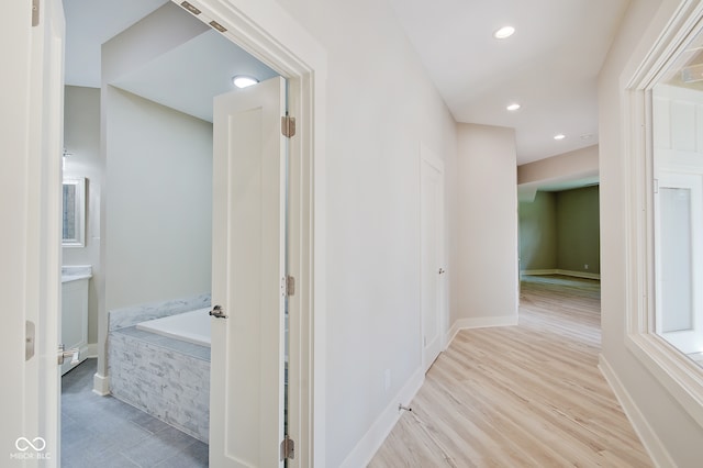 hall featuring light hardwood / wood-style flooring