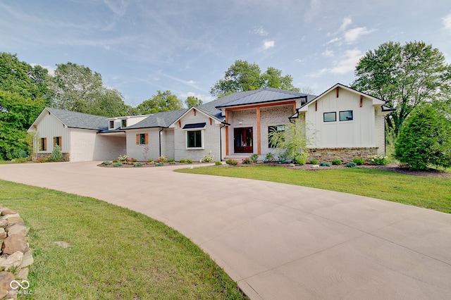 modern farmhouse with a front yard