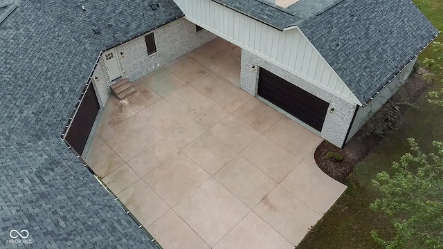 exterior details featuring tile patterned flooring