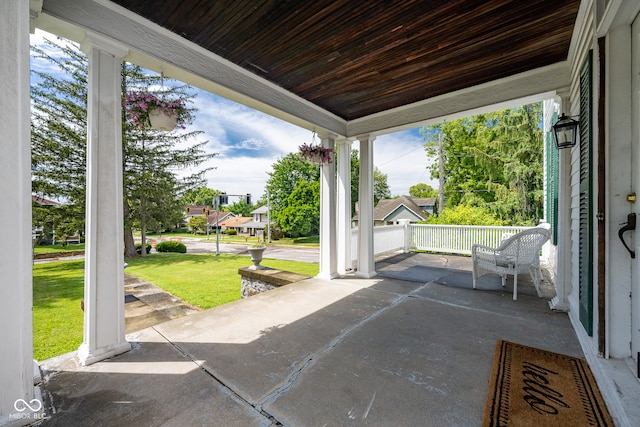 view of patio featuring a porch