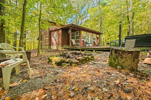 view of side of home featuring a deck