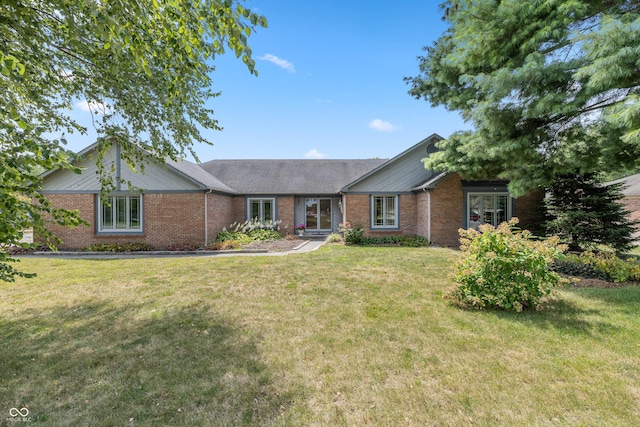 ranch-style house with a front yard