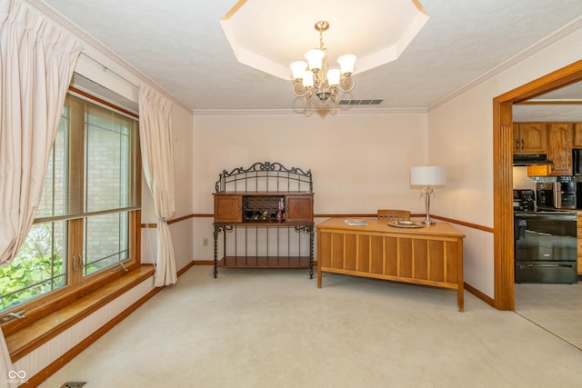 living area with an inviting chandelier, light colored carpet, a raised ceiling, crown molding, and a textured ceiling