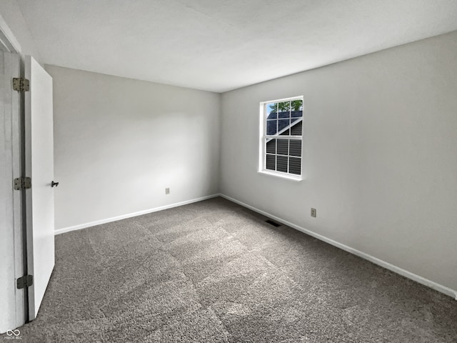 unfurnished room with carpet