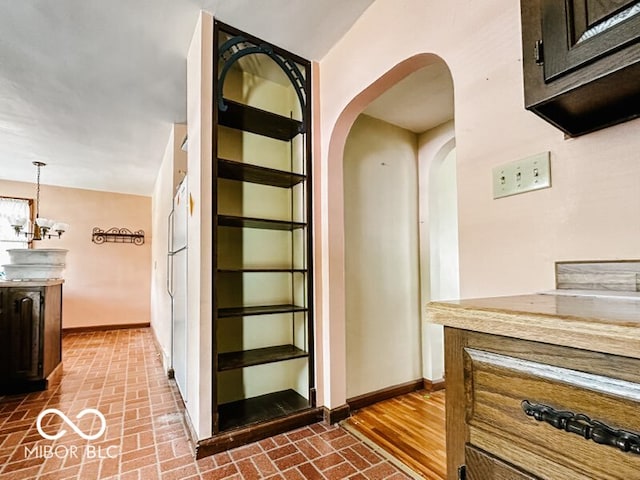 stairs featuring hardwood / wood-style floors