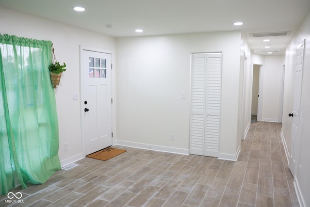 entrance foyer featuring light wood-type flooring