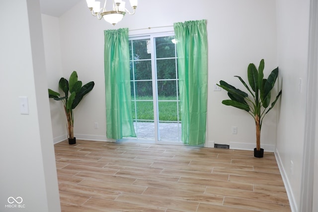 interior space with an inviting chandelier