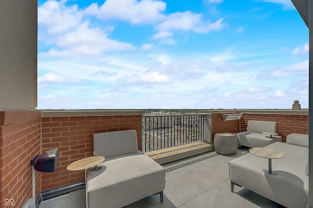 view of patio with a balcony