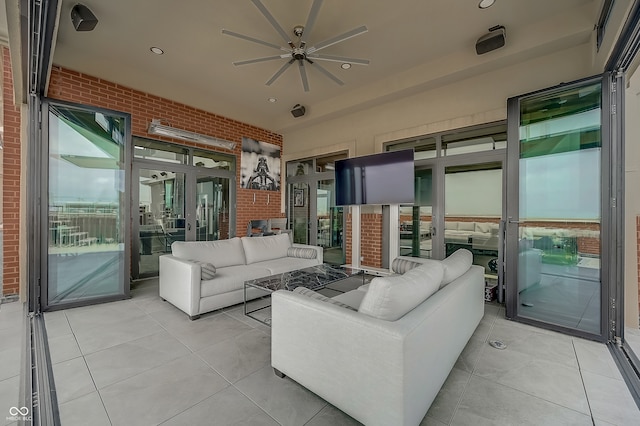 exterior space featuring an outdoor living space and ceiling fan