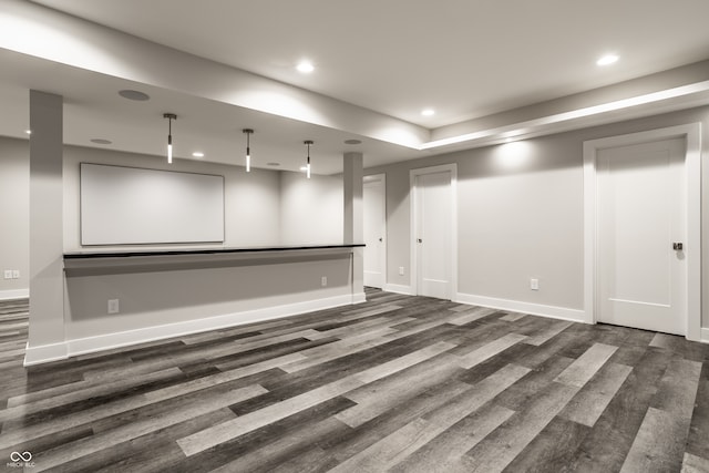 basement with dark wood-type flooring