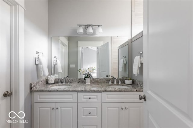 bathroom with double sink vanity