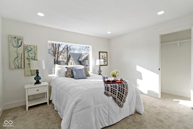 carpeted bedroom featuring a closet