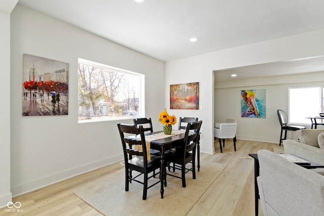 dining room with light hardwood / wood-style floors