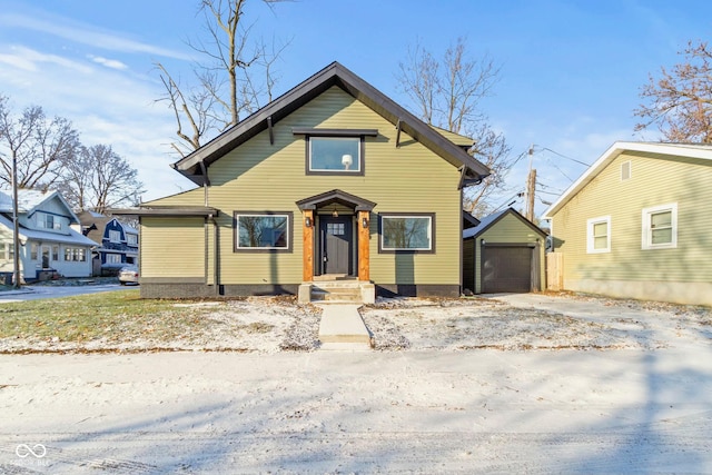 2936 N New Jersey St, Indianapolis, IN 46205 - view of front facade featuring an outbuilding, driveway, and a garage