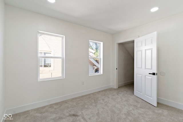 2936 N New Jersey St, Indianapolis, IN 46205 - unfurnished bedroom featuring light colored carpet, recessed lighting, and baseboards