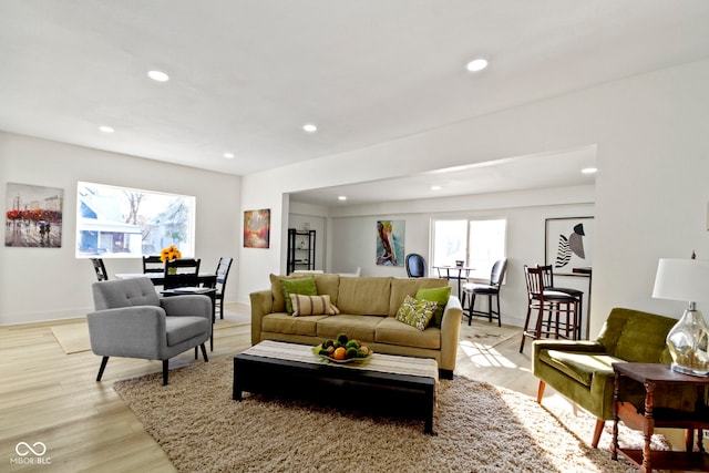 2936 N New Jersey St, Indianapolis, IN 46205 - living room featuring recessed lighting, healthy amount of natural light, light wood-style flooring, and baseboards