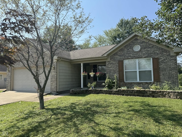 ranch-style house featuring a garage and a front lawn