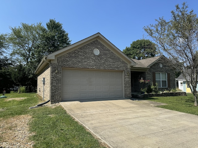 view of front facade featuring a garage and a front lawn