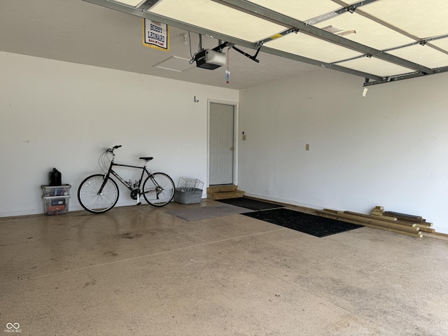 garage featuring a garage door opener