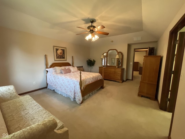 bedroom featuring light carpet, ceiling fan, visible vents, and baseboards