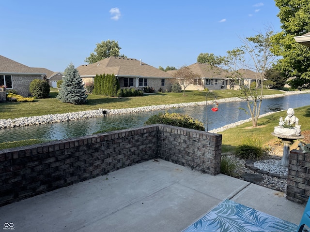 view of patio / terrace featuring a water view