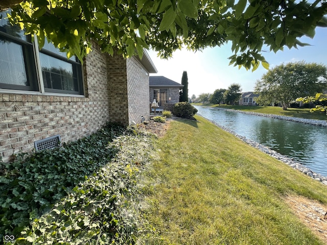 view of yard with a water view