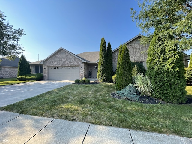 ranch-style house with a garage and a front yard