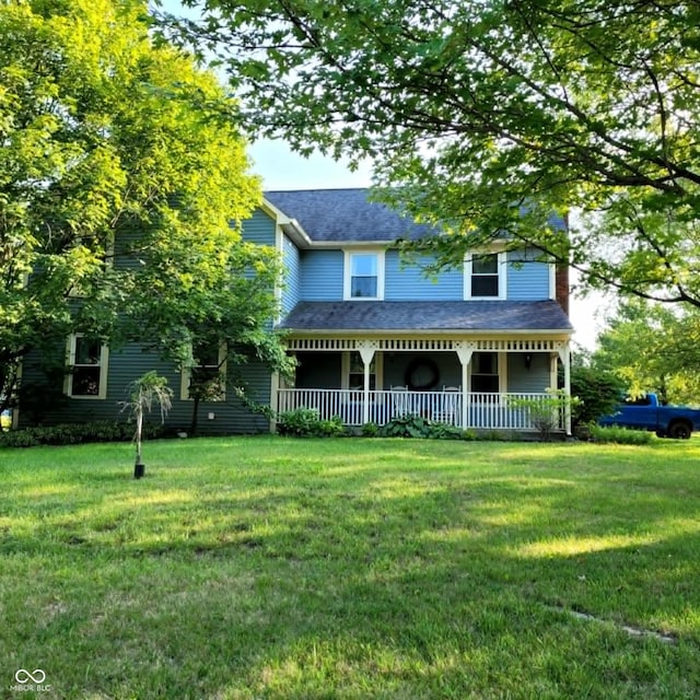 view of front of property with a front lawn