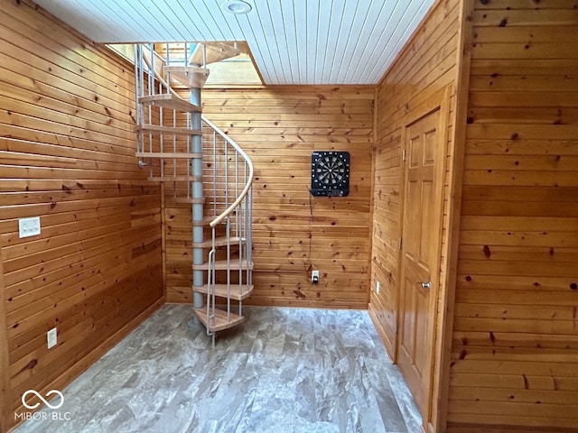 interior space with wood walls and wood ceiling