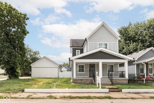 view of front of property featuring a front yard and covered porch