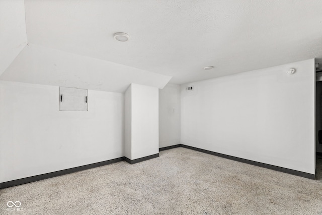 interior space featuring a textured ceiling