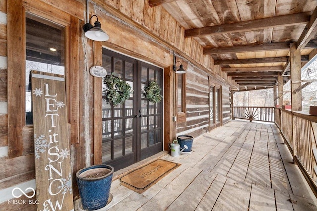 entrance to property featuring french doors