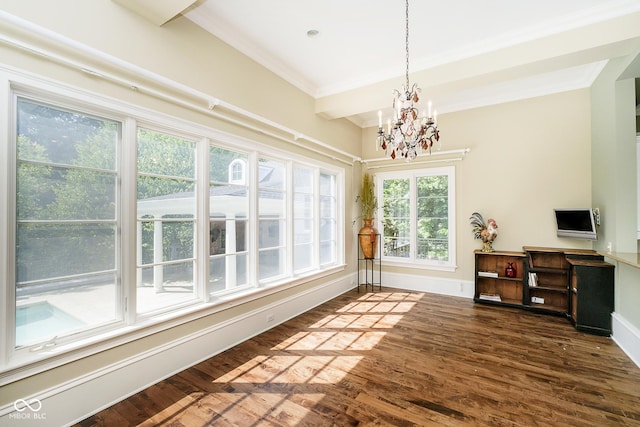 dining space with dark hardwood / wood-style flooring, a chandelier, and ornamental molding