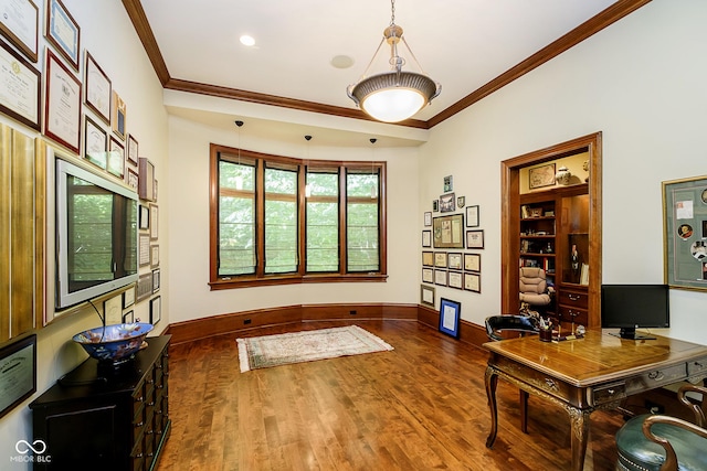 office space with dark hardwood / wood-style flooring and crown molding