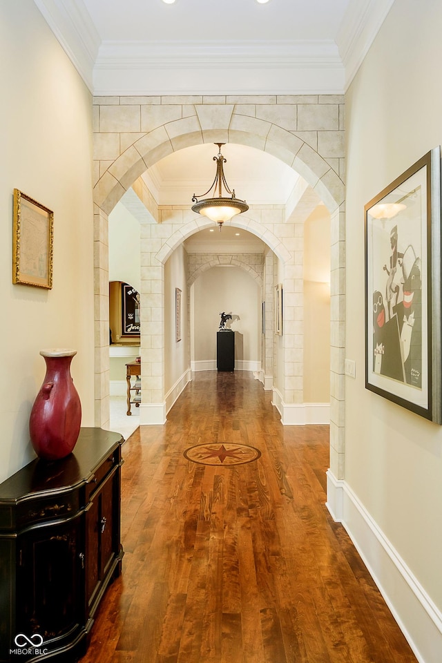 8358 Hidden Point Dr, Indianapolis, IN 46256 - corridor with arched walkways, dark wood finished floors, and ornamental molding