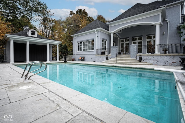 8358 Hidden Point Dr, Indianapolis, IN 46256 - swimming pool featuring a patio