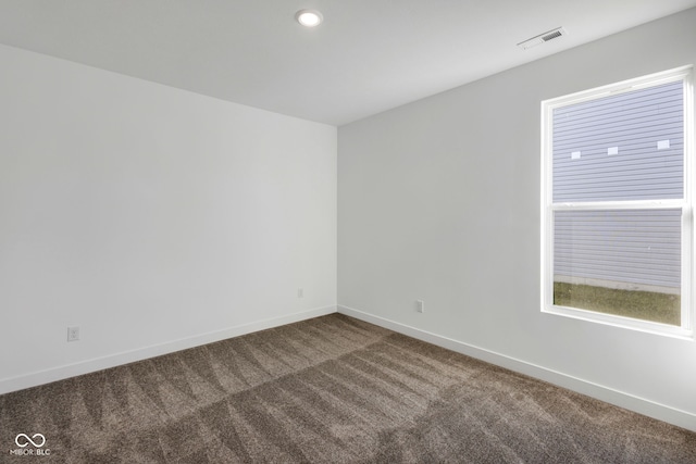 view of carpeted spare room