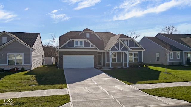 view of front of property with a garage and a front lawn